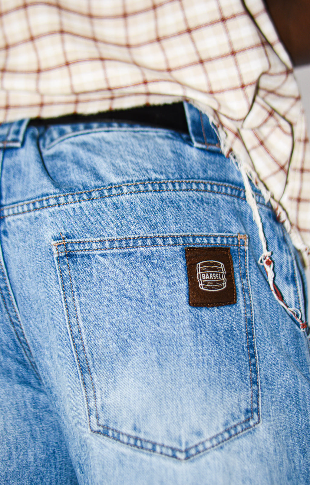 Light Blue Wash barrel jeans back pocket and Barrel logo detail